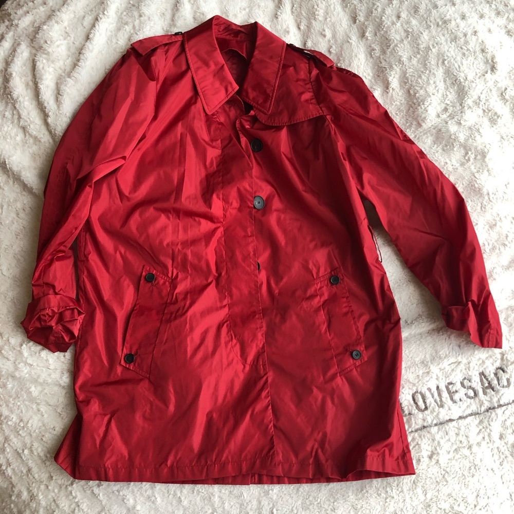 NEW. RAIN COAT